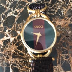 Vintage Gucci GG watch with snake skin band